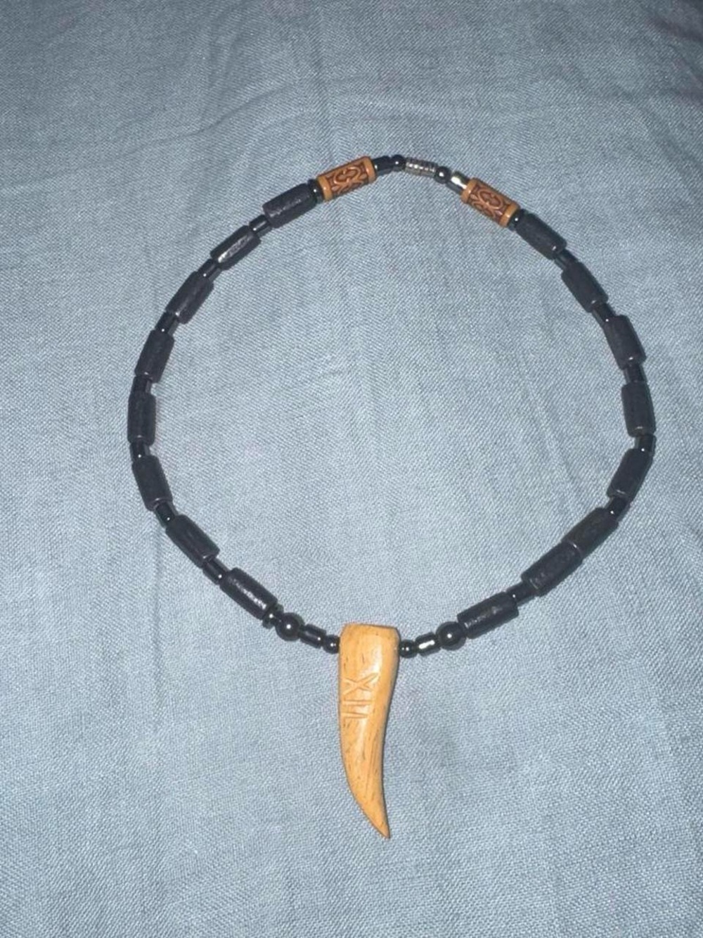Men's Black Beaded Necklace with Carved Brown Tooth Pendant